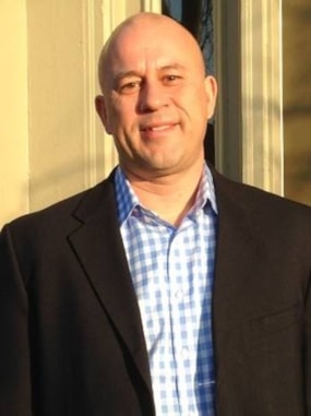 Headshot of Greg Thomson, owner of RSVP Louisville
